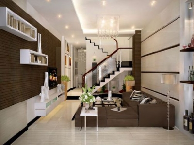 Trang trí phòng khách đẹp cho nhà lắp cửa cuốn đẹp bắt mắt